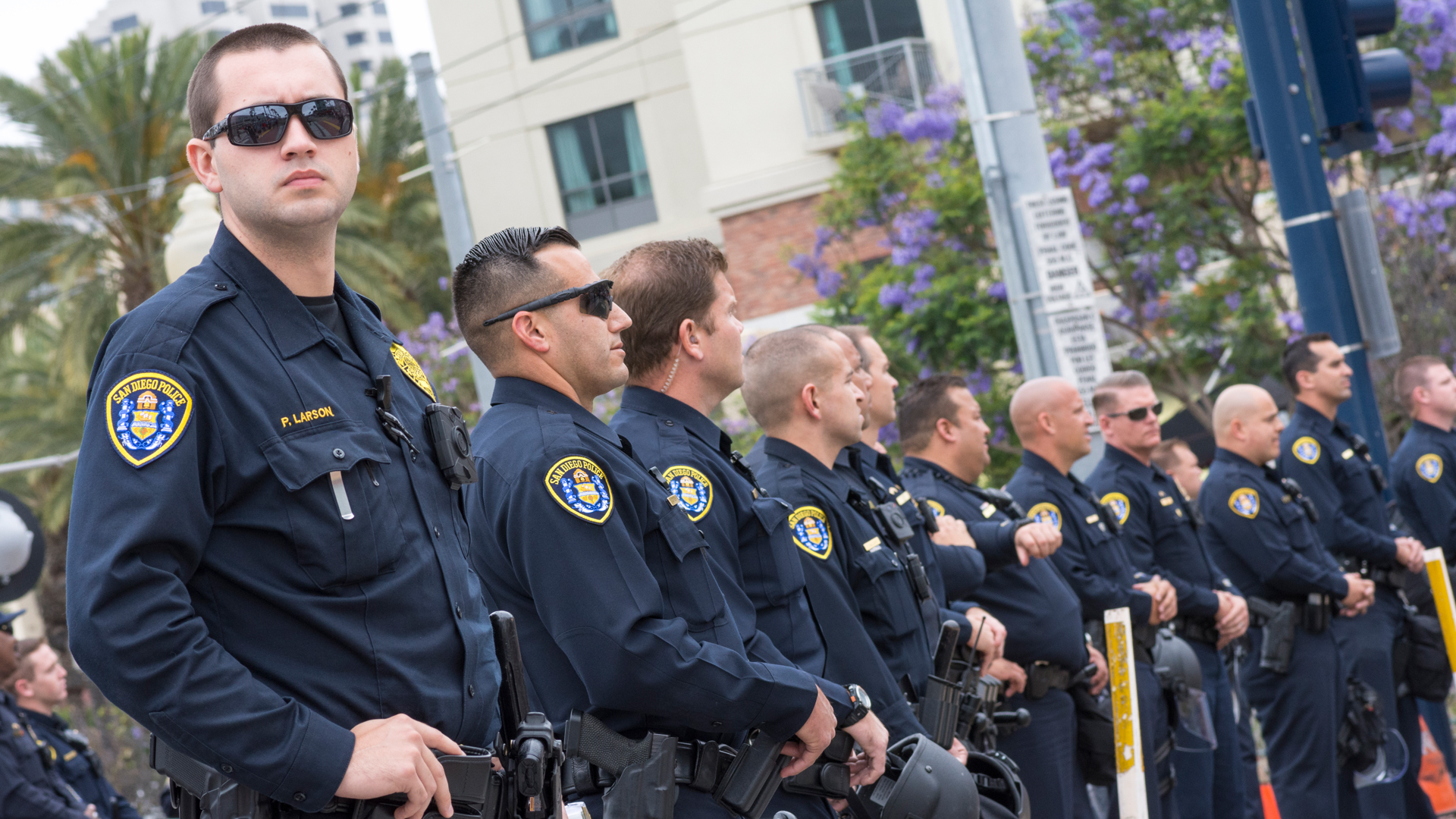 Uniformed policemen side by side